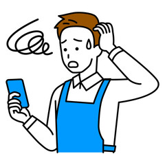 スマートフォンの画面を見て困惑するエプロン姿の男性