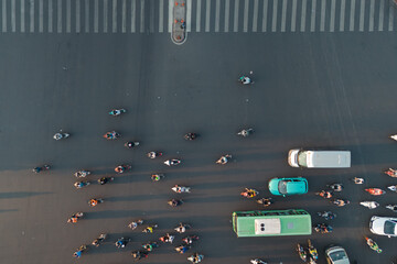 Extreme close up Aerial Top View  of Traffic at a Bustling Intersection in Ho Chi Minh City at...