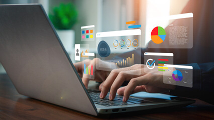 Financial business KPI System data analytics graph dashboard. Businessman using laptop and dashboard for business data analysis and data management system with KPI.  operations, sales, marketing 