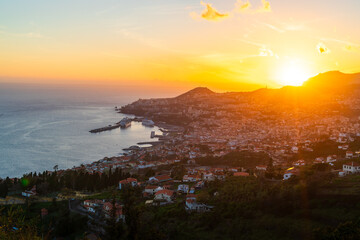 Obraz premium Landscape with Funchal at sunset time, Madeira island, Portugal