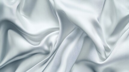 Obraz premium Elegant White Silk Fabric Texture with Flowing Waves and Soft Light