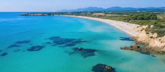 Obraz premium An aerial view of a beautiful beach and ocean scene