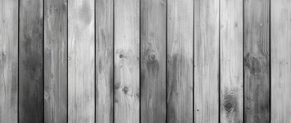 Naklejka premium The surface features a collection of weathered wooden planks arranged vertically, displaying natural textures and tones. This backdrop evokes a rustic charm, enhancing the atmosphere.