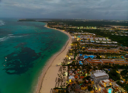 A beach with a city in the background