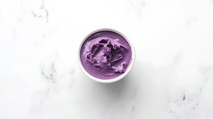 A minimalist shot of açaí in a white bowl