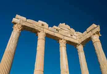 Fototapeta premium Stunning view of the ruins of the Temple of Apollo in Side. Archaeological heritage of Turkey. Mediterranean coast Manavgat district, Antalya city