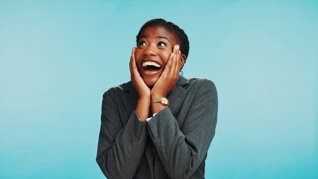 Business, black woman and surprise for success in studio, winning or excited for promotion. Shocked worker, wow or victory with good news, achievement or think of reward on blue background with space