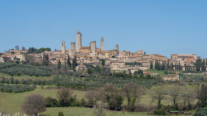 Obraz premium San Gimignano, Italy. Amazing view of the wonderful village of San Gimignano known as the Town of Five Towers. An Unesco World Heritage. Tuscany, Italy. 