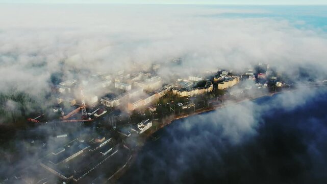 Soviet-style microdistrict in Jūrmala, surrounded by thick mist, sunrise, spring