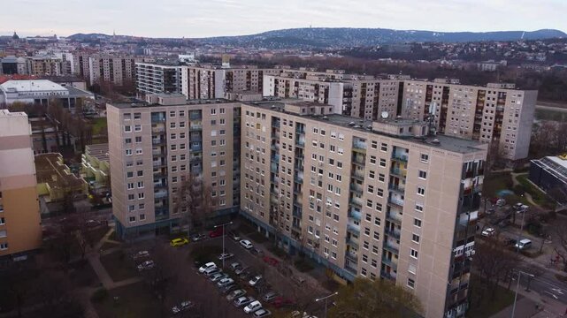 Overhead drone pullback from buildings in Budapest