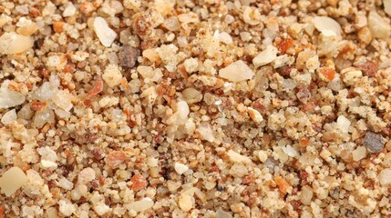 This detailed view captures the diverse textures and colors of sand grains, highlighting the natural beauty of desert environments. Each grain reveals unique characteristics and shades