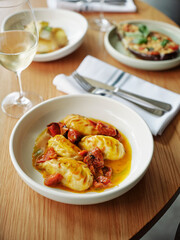 Sardinian Culurgiones in Oven-Roasted Cherry Tomato Sauce with Pinot Grigio and Roasted Eggplant...
