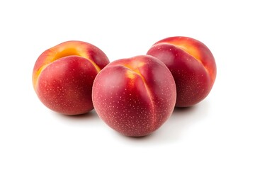 Obraz premium Three ripe nectarines isolated on white.