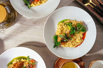 omelette with shrimps, herbs and tea
