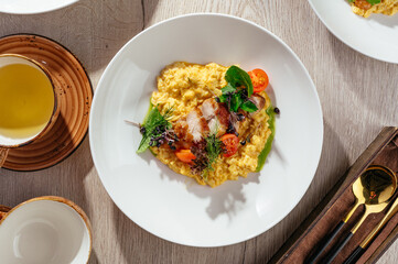 omelette with chicken, greens, tomatoes and tea