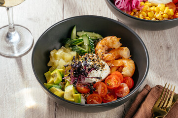 vegetable poke with shrimps, avocado and herbs