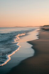 Walking along a beach at sunrise, waves softly touching the shore. The sky glows with new light, reflecting the journey ahead