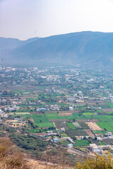 A breathtaking aerial view capturing the tranquil beauty of home villages in Pushkar, Rajasthan, India, 28 Jan 2024
