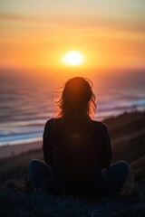 Fototapeta premium A quiet moment at sunrise, a person gazing at the horizon with a peaceful expression. Each breath carries soft words of self-affirmation