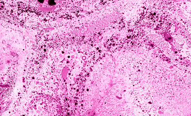 Marble texture background. Filled with purple and black dots on pink and white background. Different shades of colors. Unevenly scattered drops, different in size. Chaotical spots and blur. Abstract.