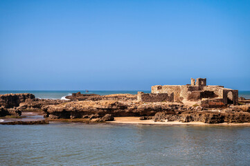 Historical ruins along the coastline of Essaouira, Morocco on a sunny day