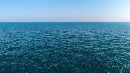 Obraz premium Serene Ocean Horizon Under Clear Blue Sky, Calm Waters and Endless Seascape View