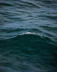 Wave texture with dark sea water. Nature texture. Abstract background.