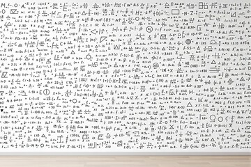 Mathematical formulas on white wall in classroom.