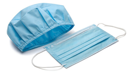 Surgical Mask and Bouffant Cap: A disposable surgical face mask and a light blue surgical bouffant cap, showcasing essential protective gear for medical environments.