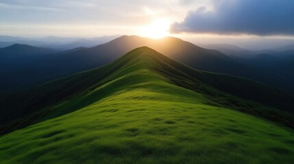Fototapeta premium Lush mountain peak at sunset