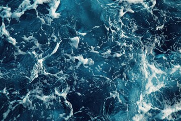 Ocean water surface texture.  Foamy waves, deep blue, intense