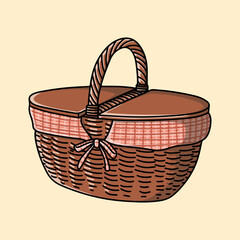 Fototapeta premium A classic woven basket with a handle, perfect for picnics and storage.