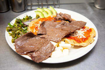 Beef jerky barbacoa is the traditional dish of Atlixco in the Puebla region of Mexico.