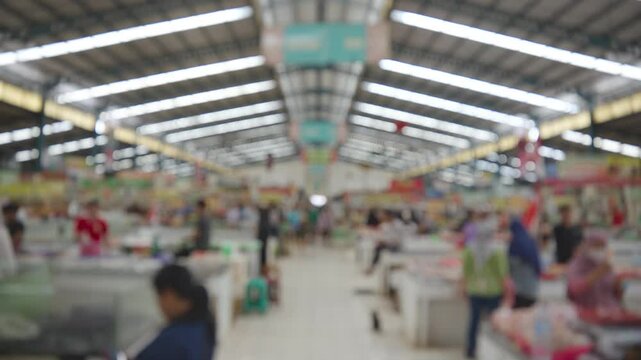 Abstract Blurred Traditional market, people buy food in the traditional market. Fresh vegetables, fresh fruits, cheese, meat, and other foods.