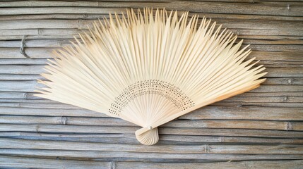 Elegant Bamboo Fan on Rustic Wooden Background