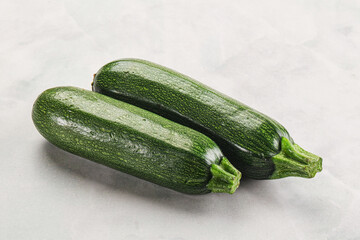 Raw green ripe zucchini vegetable
