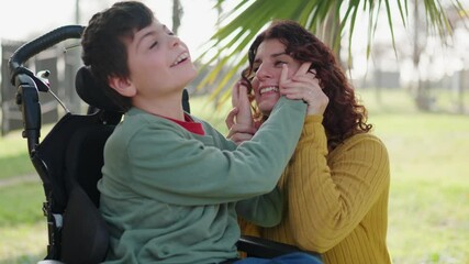 Disabled child and mother sharing a tender moment in the park