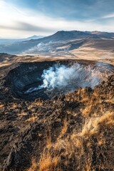 A photograph of a field with a large crater in the middle