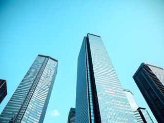 Naklejka premium Corporate office buildings towers skyscrapers low angle