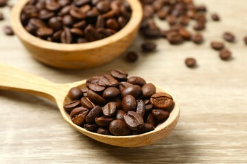 Coffee beans on wooden background