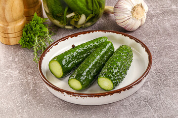 Homemade lighty salted cucumbers with herbs