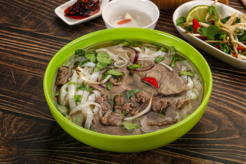 Vietnamese Pho Bo soup with beef and noodles
