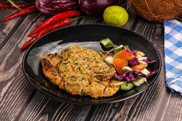 Tasty chicken steak with vegetables