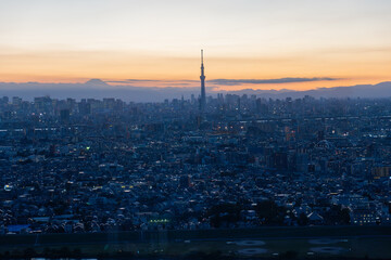 Sunset at Tokyo Sky Tree and Mt fuji with cityscape view from the Ichikawa I-link town Observation deck