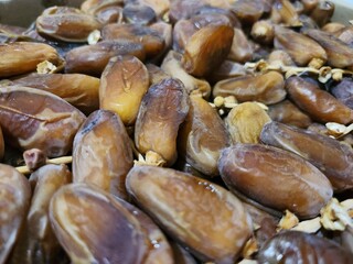 Dried dates in a box. Texture of dates