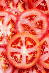 Pile of sliced fresh tomatoes. Top view
