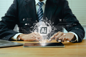 Humans are using laptops and computers to interact with AI, helping them create, code, train AI, or...