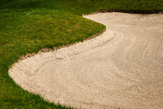 A sand trap on a golf course