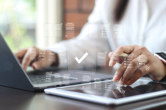 Businesswoman Take an assessment, Check list, questionnaire, evaluation, filling out an online survey form. Answer the test questions. online survey exam Choosing the right answer in the exam,