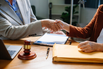 Two lawyers are discussing about contract paper, law matters determination, pointing.law